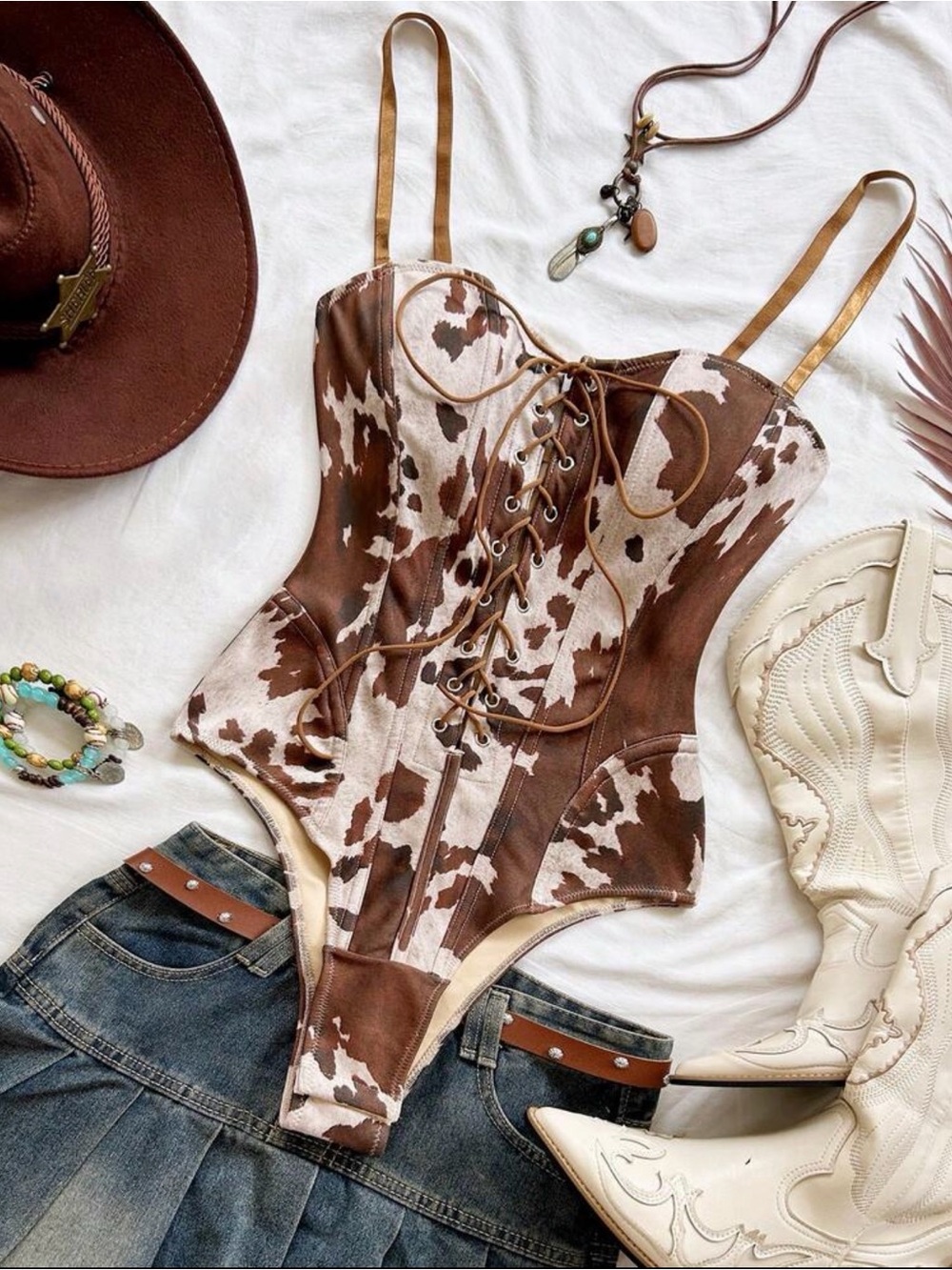Cow Print Lace-Up One-Piece bodysuit in Brown